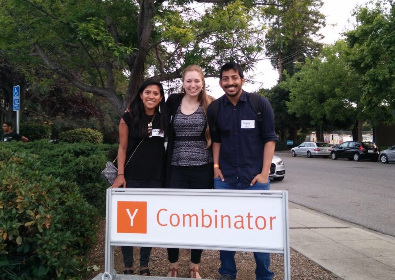 Adriana and Sujay with a fellow founder outside the Y Combinator office.